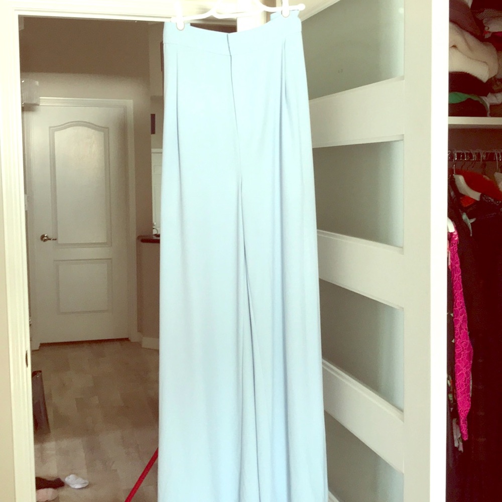 Baby blue pants never worn. Doesn't fit me